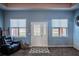 Bright entryway with stained glass door and two windows at 8243 Alturas Rd, Bartow, FL 33830