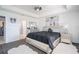 Main bedroom boasts a king-size bed and a large window at 8243 Alturas Rd, Bartow, FL 33830