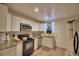 Kitchen with granite countertops and stainless steel appliances at 841 4Th St, Winter Haven, FL 33881