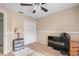 Bright bedroom with double doors and ceiling fan at 910 Nancy Ct, Kissimmee, FL 34759