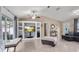 Living room with built-in entertainment center and bench at 910 Nancy Ct, Kissimmee, FL 34759