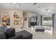 Open-concept living room with views into the kitchen at 910 Nancy Ct, Kissimmee, FL 34759