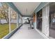 Screened porch with backyard access at 910 Nancy Ct, Kissimmee, FL 34759