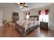 Spacious main bedroom with king-size bed and dresser, offering lots of storage at 9365 Lemon Dr, Lake Wales, FL 33898