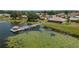 Aerial view of lakefront property with dock at 3909 Cypress E Lndg, Winter Haven, FL 33884