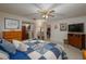 Primary bedroom with a queen-size bed and access to the bathroom at 3909 Cypress E Lndg, Winter Haven, FL 33884