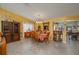 Bright dining room featuring a wood table and built-in hutch at 3909 Cypress E Lndg, Winter Haven, FL 33884