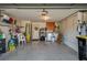 Garage with washer and dryer, storage shelves, and a bicycle at 3909 Cypress E Lndg, Winter Haven, FL 33884