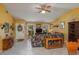 Cozy living room with floral sofa and wood coffee table at 3909 Cypress E Lndg, Winter Haven, FL 33884