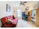 Home office with a futon, desk, and bookcase at 1099 Tequesta Trl, Lake Wales, FL 33898