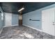 Unfurnished basement room with light blue walls and flooring at 1244 W 9Th St, Lakeland, FL 33805