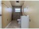 Small bathroom with shower, toilet and vanity at 1244 W 9Th St, Lakeland, FL 33805