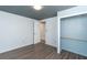 Simple bedroom with wood-look floors and a closet at 1244 W 9Th St, Lakeland, FL 33805