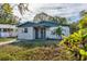 A remodeled one-story home with a manicured lawn at 1244 W 9Th St, Lakeland, FL 33805