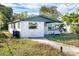 A charming one-story home with a well-maintained lawn at 1244 W 9Th St, Lakeland, FL 33805