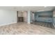 Open concept kitchen and living area with gray tile floors at 1244 W 9Th St, Lakeland, FL 33805