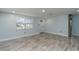 Spacious living area with light walls and wood-look floors at 1244 W 9Th St, Lakeland, FL 33805