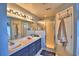Bathroom with double sinks, shower, and a bathtub at 1490 Meadows Pond Dr, Bartow, FL 33830