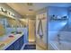 Bathroom with double sinks, shower, and a bathtub at 1490 Meadows Pond Dr, Bartow, FL 33830