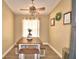 Farmhouse-style dining area with a rustic wooden table at 1490 Meadows Pond Dr, Bartow, FL 33830