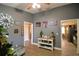 Open dining room with a view into the kitchen and living room at 1490 Meadows Pond Dr, Bartow, FL 33830