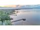Aerial view of waterfront property with multiple private docks at 1769 S Lake Reedy Blvd, Frostproof, FL 33843