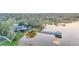 Aerial view showing house, dock, and lake at 1769 S Lake Reedy Blvd, Frostproof, FL 33843