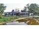 House with solar panels, screened porch, dock and lake access at 1769 S Lake Reedy Blvd, Frostproof, FL 33843