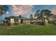 Large backyard with screened porch and lush lawn at 1769 S Lake Reedy Blvd, Frostproof, FL 33843