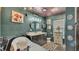 Bathroom with soaking tub and patterned tile floor at 1769 S Lake Reedy Blvd, Frostproof, FL 33843