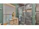 Bathroom with a large walk-in shower and dark tile at 1769 S Lake Reedy Blvd, Frostproof, FL 33843