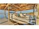 Pontoon boat in covered boat lift on the waterfront at 1769 S Lake Reedy Blvd, Frostproof, FL 33843