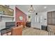 Entryway with wood floors, chandelier, and home office area at 1769 S Lake Reedy Blvd, Frostproof, FL 33843