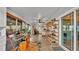 Spacious Florida room with multiple seating areas and storage at 1769 S Lake Reedy Blvd, Frostproof, FL 33843