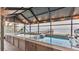 Relaxing hot tub with lake view from a covered patio at 1769 S Lake Reedy Blvd, Frostproof, FL 33843
