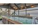 Relaxing hot tub with screened enclosure and water view at 1769 S Lake Reedy Blvd, Frostproof, FL 33843