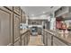 Spacious kitchen with stainless steel appliances and granite countertops at 1769 S Lake Reedy Blvd, Frostproof, FL 33843