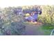 House and yard aerial view at 2036 Lake Ariana Blvd, Auburndale, FL 33823