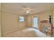 Bedroom with sliding door access to patio at 2036 Lake Ariana Blvd, Auburndale, FL 33823