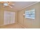 Simple bedroom with large closet and window at 2036 Lake Ariana Blvd, Auburndale, FL 33823