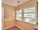 Breakfast nook with stained glass light fixture at 2036 Lake Ariana Blvd, Auburndale, FL 33823