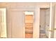 Large walk-in closet with built-in shelving at 2036 Lake Ariana Blvd, Auburndale, FL 33823