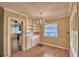 Dining room with hardwood floors, chandelier, and built-in cabinets at 2036 Lake Ariana Blvd, Auburndale, FL 33823
