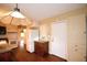 Kitchen with wood cabinets and granite countertops at 2036 Lake Ariana Blvd, Auburndale, FL 33823