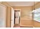 Laundry room with stackable washer and dryer at 2036 Lake Ariana Blvd, Auburndale, FL 33823