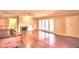 Bright living room with hardwood floors and fireplace at 2036 Lake Ariana Blvd, Auburndale, FL 33823