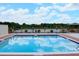 Refreshing community pool with ample deck space for lounging at 235 Lake Suzanne Dr, Lake Wales, FL 33859