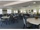 Spacious community room with tables and chairs at 235 Lake Suzanne Dr, Lake Wales, FL 33859