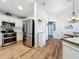 Spacious kitchen boasts ample counter space, stainless steel appliances, and white cabinetry at 235 Lake Suzanne Dr, Lake Wales, FL 33859