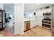 Modern kitchen with stainless steel appliances and white cabinets at 235 Lake Suzanne Dr, Lake Wales, FL 33859